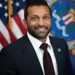 FBI Director Kash Patel in his official portrait, defending hiring changes before the Senate.