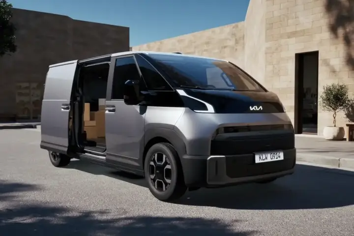 Kia PV5 electric cargo van with sliding door open representing electric vehicle for Aptera solar EV article.
