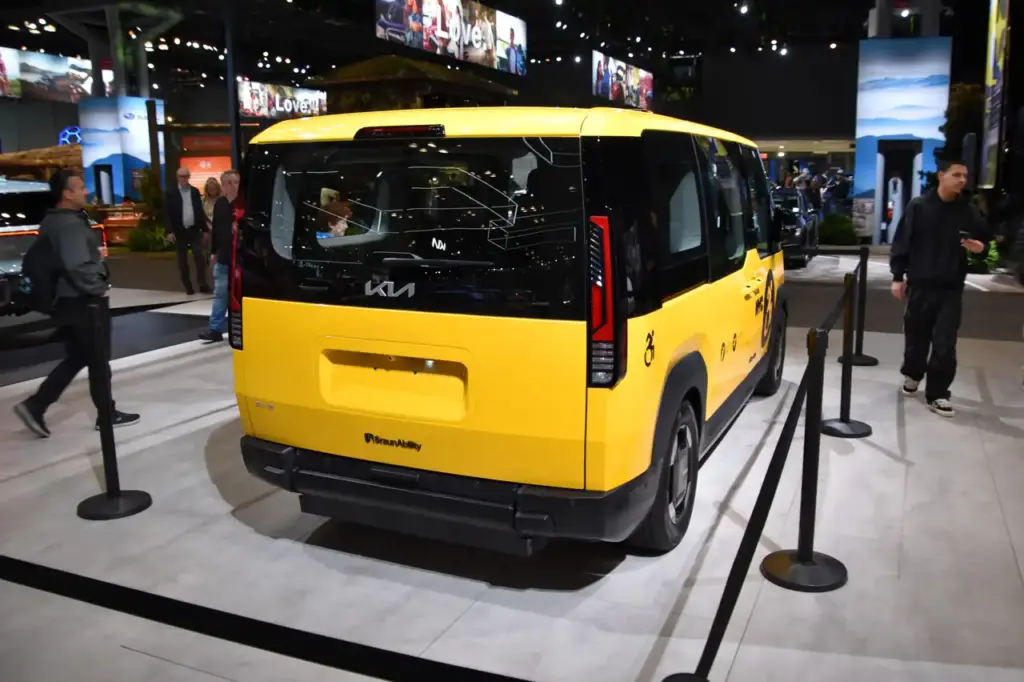 Kia PV-5 concept electric van displayed at an auto show, the vehicle family that includes the new Kia PV7 commercial electric van.