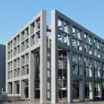 A modern museum building exterior with geometric architectural lines.