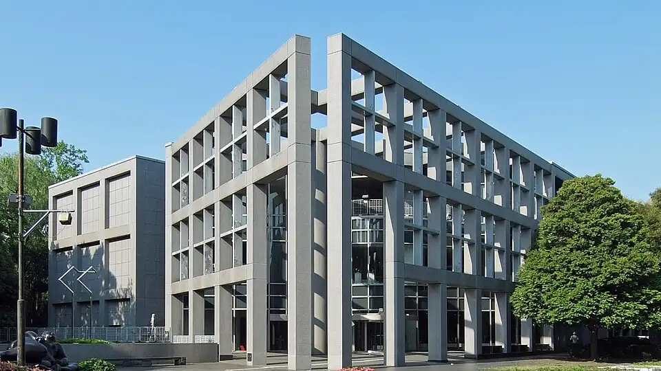 A modern museum building exterior with geometric architectural lines.