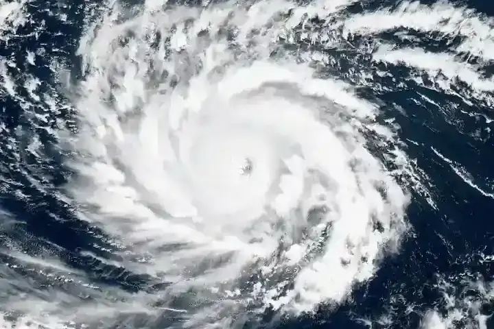 Pacific coastal storm imagery representing the Malibu beachfront sinkhole and evacuation risk.