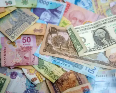 U.S. dollar and Mexican peso banknotes placed together to illustrate currency exchange rates.