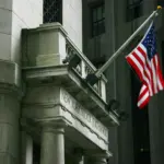 The New York Stock Exchange building on Wall Street, the heart of US financial markets.