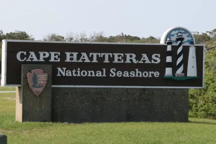 Atlantic ocean waves breaking along the shoreline sandbars at Cape Hatteras National Seashore on the Outer Banks.