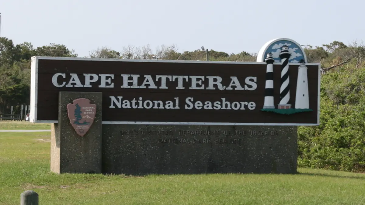 Atlantic ocean waves breaking along the shoreline sandbars at Cape Hatteras National Seashore on the Outer Banks.