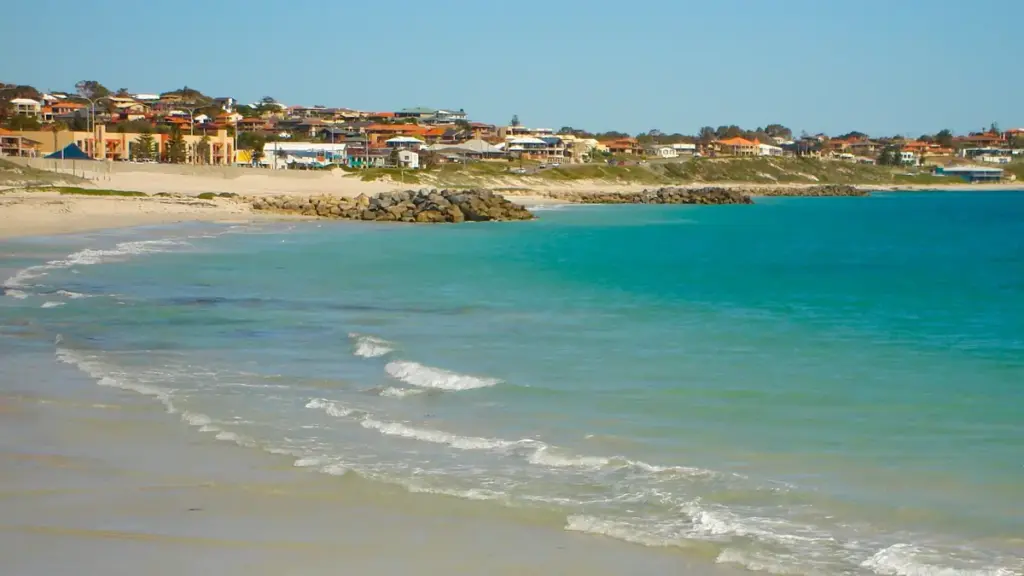 Golden shoreline and breaking coastal surf at Sorrento Beach near Hillarys Boat Harbour in northern metropolitan Perth.