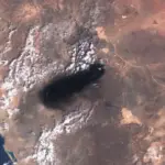 Smoke rising from the East-West Crude Oil Pipeline in Saudi Arabia, the infrastructure behind supply disruptions and strategic energy leverage.