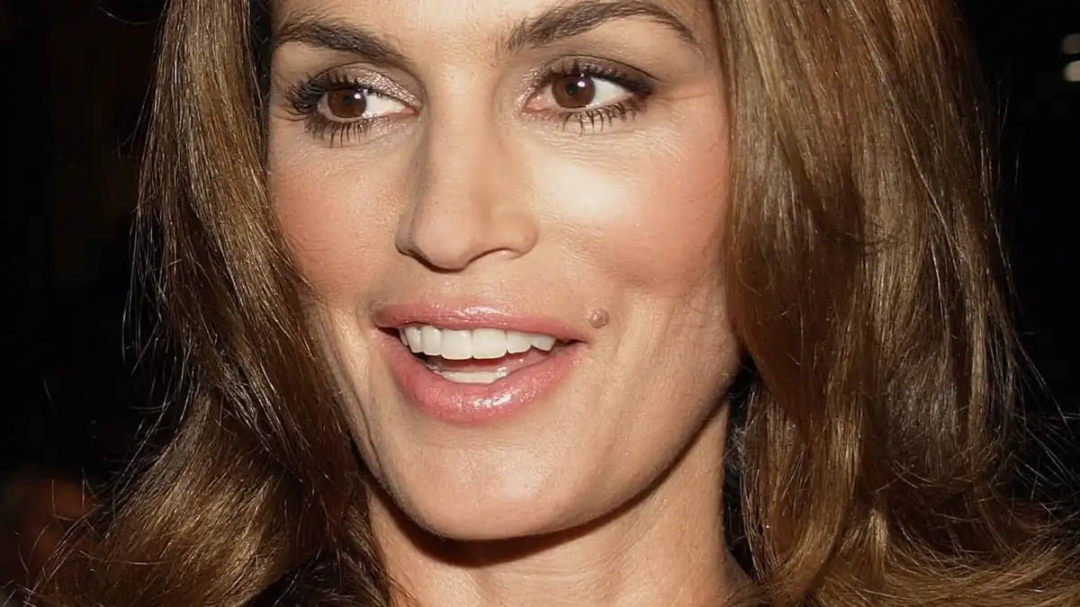 Portrait of Cindy Crawford outdoors during a media appearance.