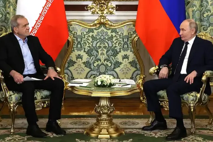Russian President Vladimir Putin and Iranian President Masoud Pezeshkian during bilateral talks.