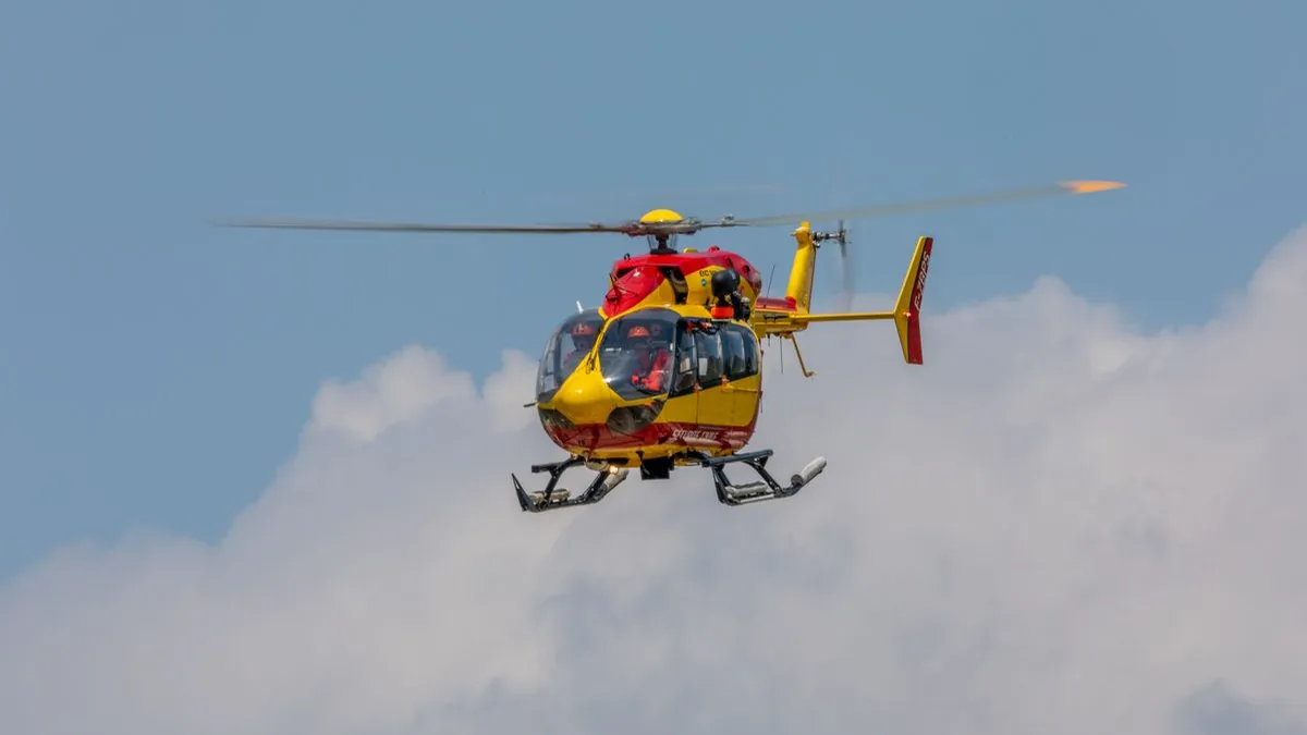 Emergency response vehicles at helicopter crash site near Montreal