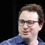 Anthropic CEO Dario Amodei speaking at a technology conference about frontier artificial intelligence development