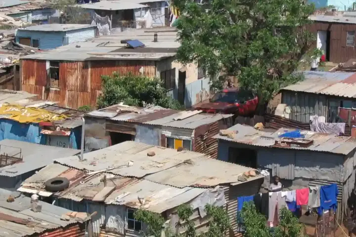 South African police at scene of mass shooting in Wedela township