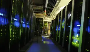 Server room with racks of computing hardware for AI copyright lawsuit context