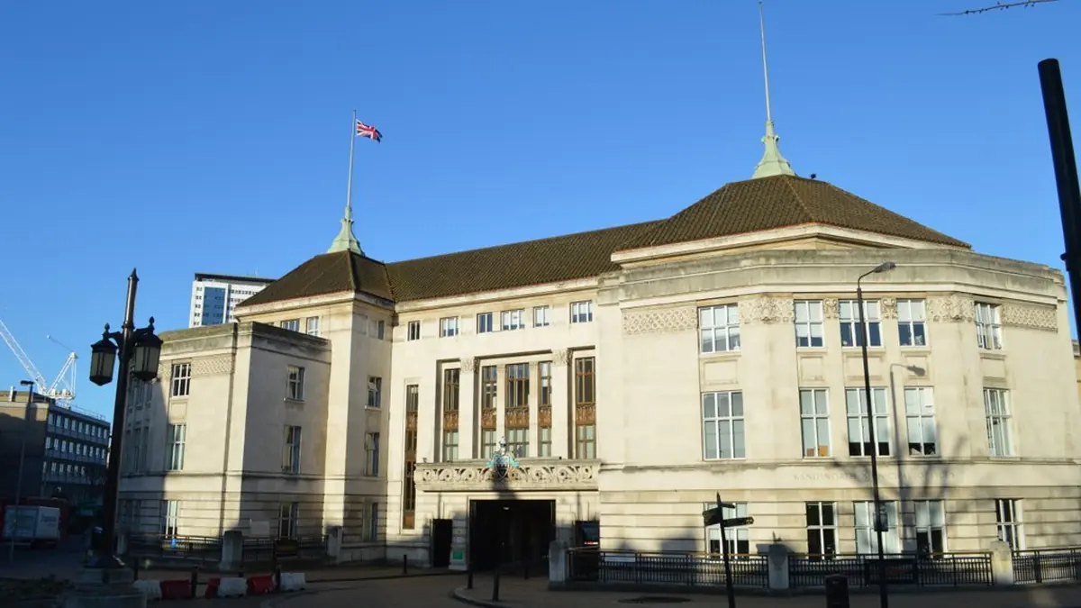 Brick and stone facade of Wandsworth Town Hall in south-west London, used for council tax funding reporting.