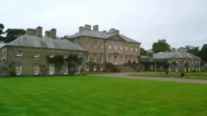 Palladian stone frontage of Dumfries House in Ayrshire, Scotland, where King Charles hosted an AI summit.