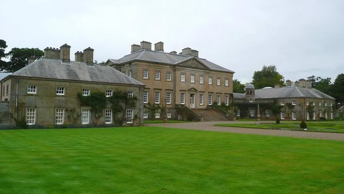 Palladian stone frontage of Dumfries House in Ayrshire, Scotland, where King Charles hosted an AI summit.