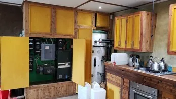 Kitchen interior with counters and cooking equipment used as context for food-safety inspections.