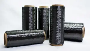 Carbon fiber composite material with woven texture
