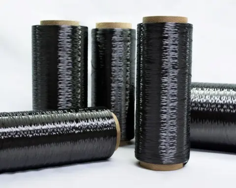 Carbon fiber composite material with woven texture