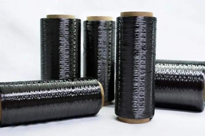 Carbon fiber composite material with woven texture