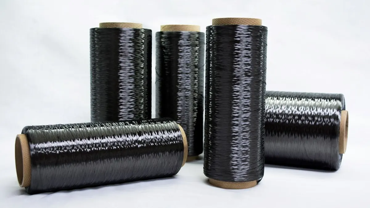 Carbon fiber composite material with woven texture