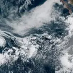 Satellite image of a tropical cyclone cloud formation over the Pacific Ocean near Hawaii