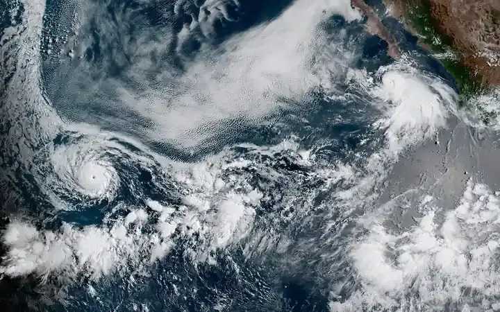 Satellite image of a tropical cyclone cloud formation over the Pacific Ocean near Hawaii