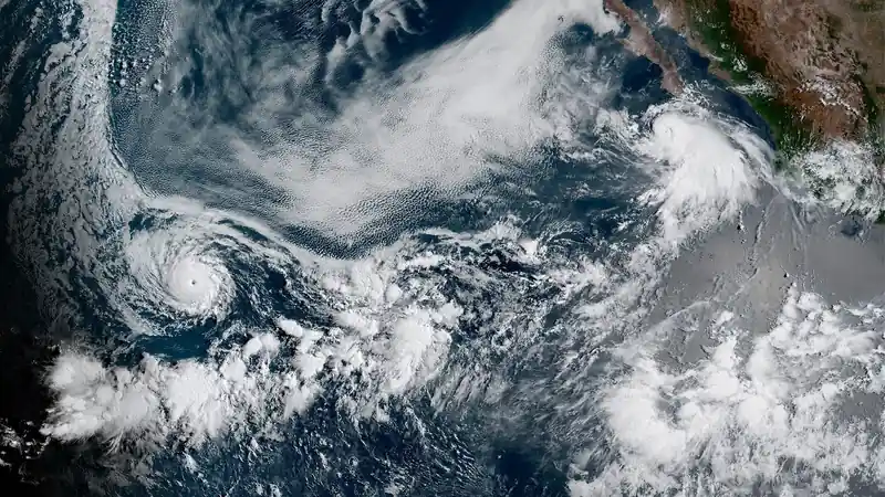 Satellite image of a tropical cyclone cloud formation over the Pacific Ocean near Hawaii