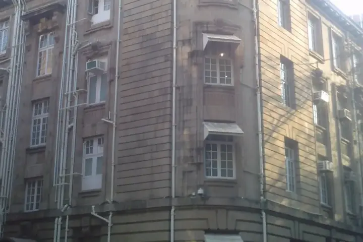 Exterior stone facade of Bombay House, the corporate headquarters of Tata Sons on Homi Mody Street in Mumbai