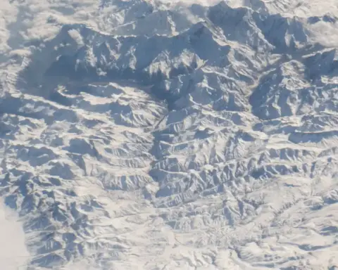 Aerial view of the steep mountain ridges and river gorges forming the Gyirong corridor along the China-Nepal border