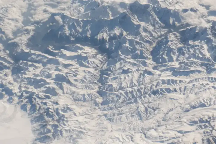 Aerial view of the steep mountain ridges and river gorges forming the Gyirong corridor along the China-Nepal border