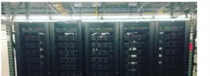 Server racks and network cables inside a data center