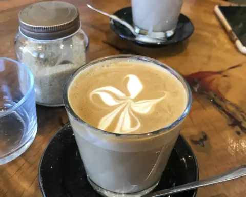 Cup of coffee served at a Sydney cafe in Australia on a table