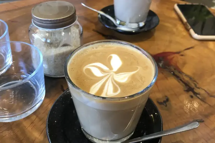 Cup of coffee served at a Sydney cafe in Australia on a table