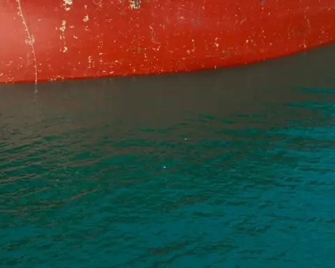 Large commercial crude oil carrier docked at an offshore loading platform in northern Persian Gulf waters