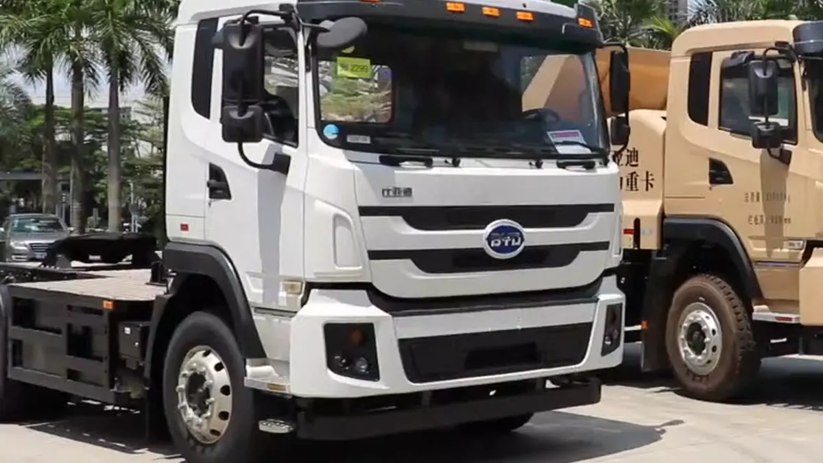 White BYD heavy electric truck displayed outdoors