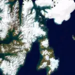 Landsat satellite image of Svalbard Arctic showing ice and fjord landscape