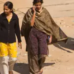 Woman using a mobile phone in Bengaluru, India.
