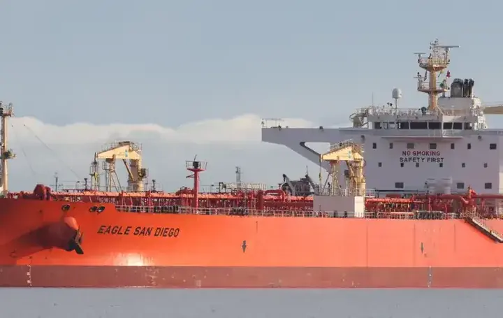 Crude oil tanker at a marine terminal representing oil supply pressure behind UK petrol prices.