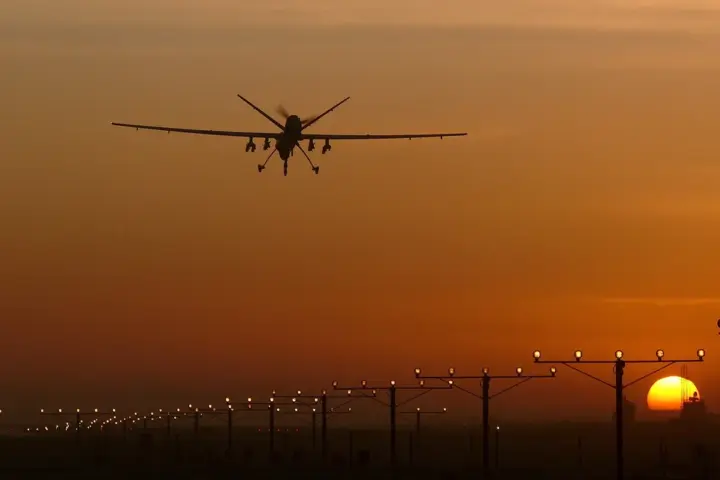 Reaper remotely piloted aircraft landing on a military runway during defence operations