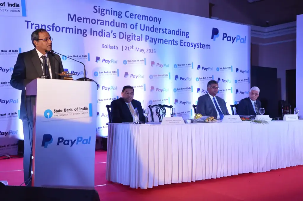 B. Sriram speaking at the SBI-PayPal digital payment ecosystem agreement signing ceremony in Kolkata, representing India's evolving payments landscape.