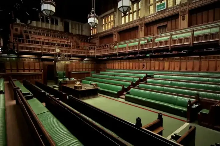 UK House of Commons chamber in Westminster where MPs debate and vote on legislation