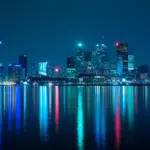 Toronto skyline at night representing the city hosting Nuit Blanche all-night public art event