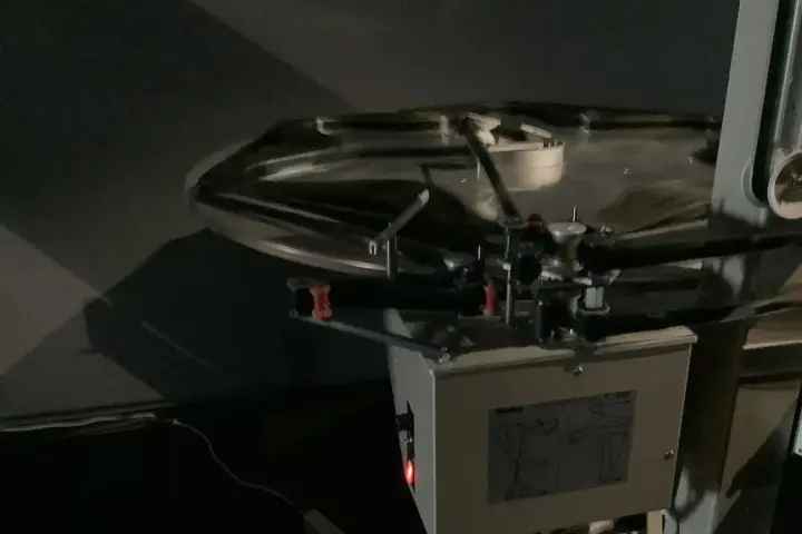 Film reel on an IMAX projector, used as a representative image for Yuri Nakamura’s screen career.