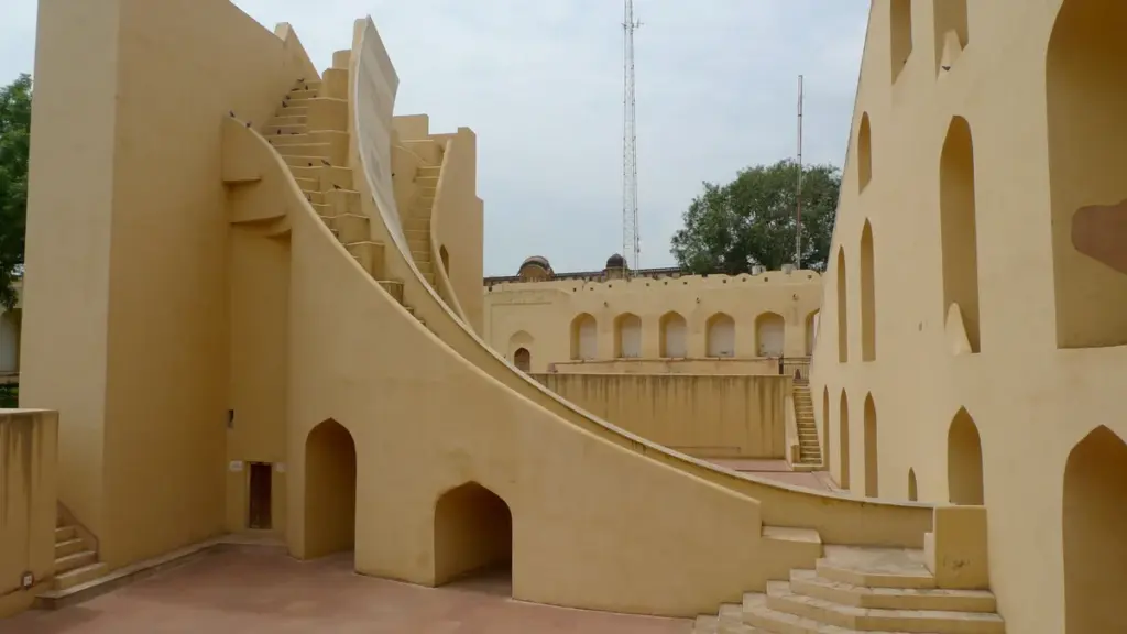 Stone astronomical structures and landscaped grounds at Jantar Mantar in New Delhi.
