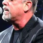 Billy Joel performing onstage in Jacksonville, Florida, in 2007.