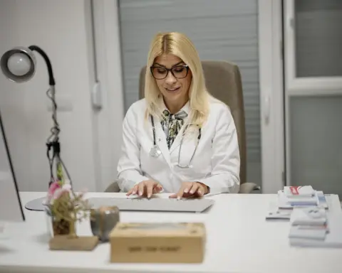 Healthcare professional consulting with a patient