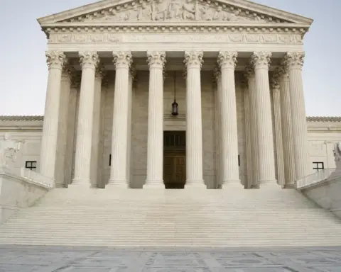 Front facade of the United States Supreme Court building in Washington, D.C., displaying marble pillars and the inscription Equal Justice Under Law.