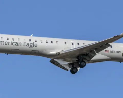 American Eagle PSA Airlines CRJ-900 aircraft on approach at Baltimore/Washington International Airport.